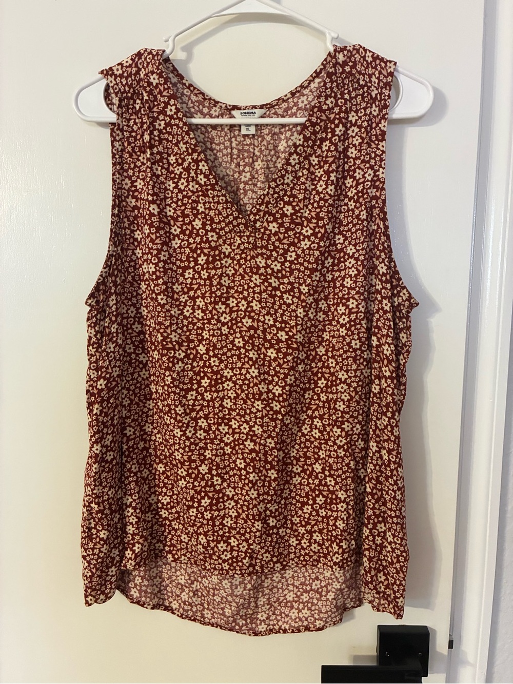 Sleeveless Floral V-Neck Top in a Burgundy with Cream-colored Floral Pattern